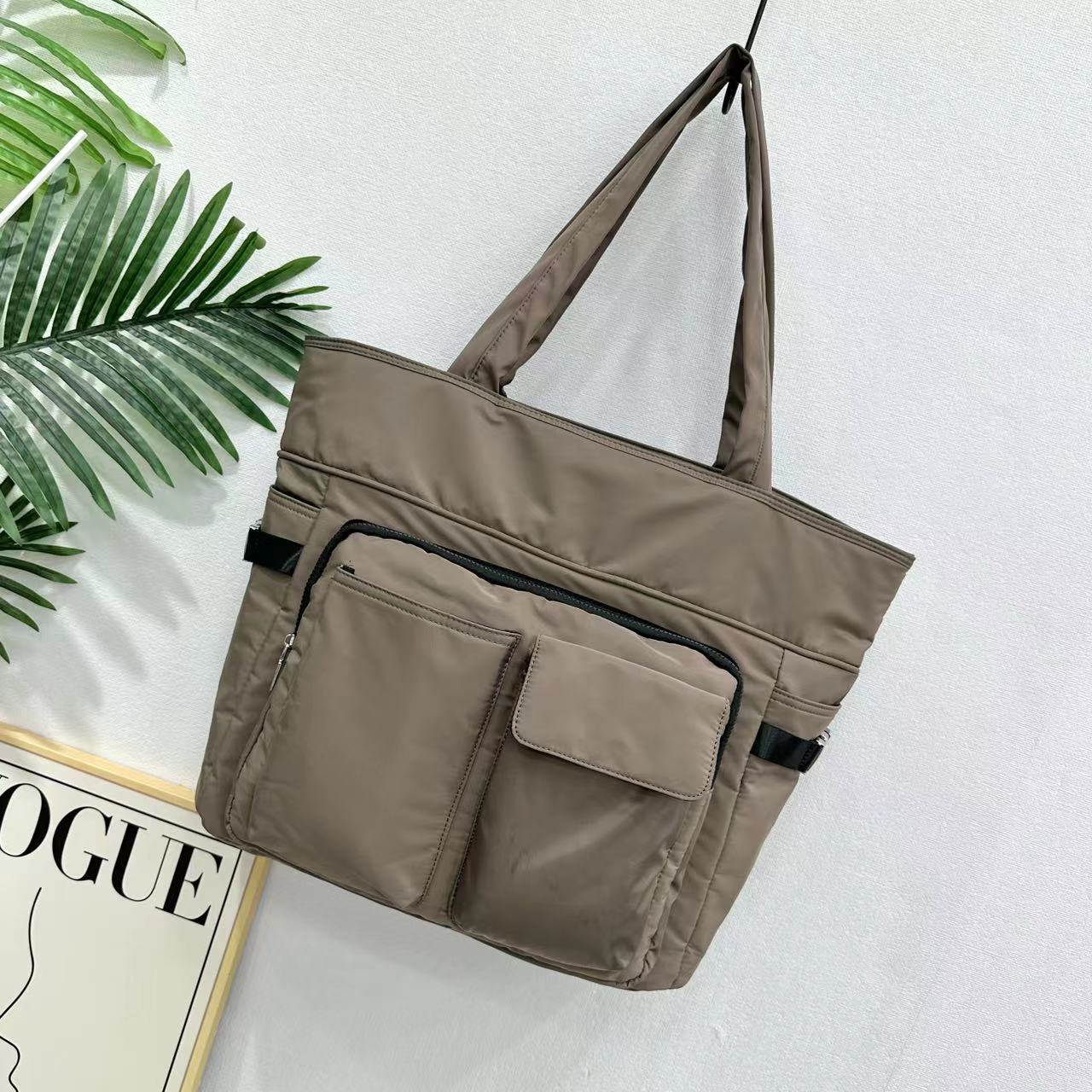 Large utility tote bag with dual front pockets, structured handles, and functional design – perfect for everyday carry, college, or work use. Built for high capacity and easy organization, ideal for Indian shoppers looking for bold, practical fashion. A premium utility essential from Tales of Totes competing with top Indian brands like Zouk, Lavie, and Chumbak."

