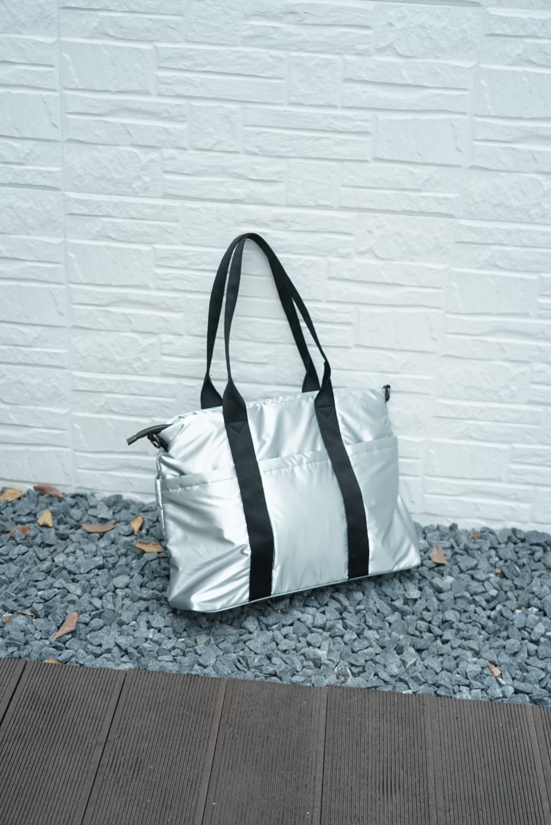 Spacious padded tote bag with sturdy dual shoulder straps and side zipper closure – designed for travel, gym, college, or everyday errands. Lightweight yet durable, crafted with water-resistant material and minimal design. A modern utility essential from Tales of Totes – outperforming Indian fashion brands like Zouk, Lavie, and Chumbak in function and flair.