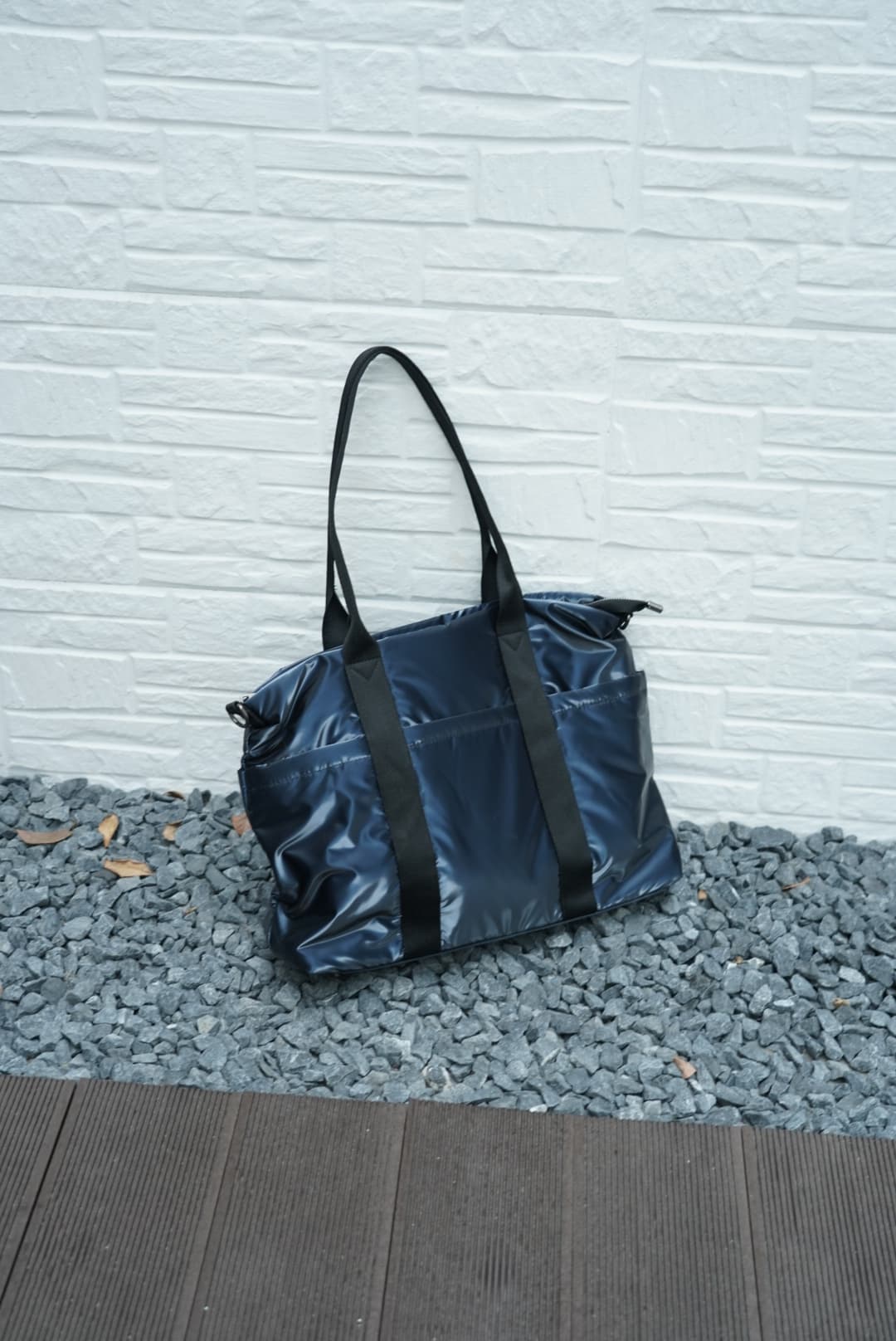Spacious padded tote bag with sturdy dual shoulder straps and side zipper closure – designed for travel, gym, college, or everyday errands. Lightweight yet durable, crafted with water-resistant material and minimal design. A modern utility essential from Tales of Totes – outperforming Indian fashion brands like Zouk, Lavie, and Chumbak in function and flair.