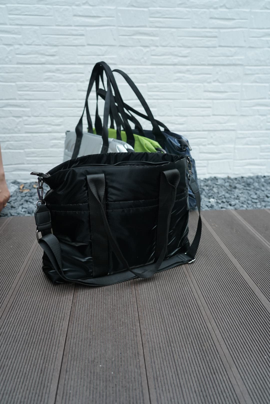 Spacious padded tote bag with sturdy dual shoulder straps and side zipper closure – designed for travel, gym, college, or everyday errands. Lightweight yet durable, crafted with water-resistant material and minimal design. A modern utility essential from Tales of Totes – outperforming Indian fashion brands like Zouk, Lavie, and Chumbak in function and flair.