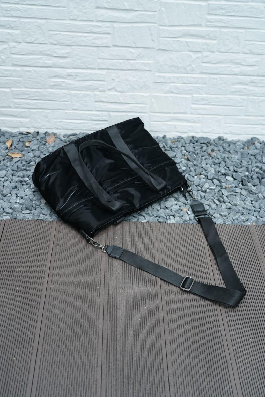 Spacious padded tote bag with sturdy dual shoulder straps and side zipper closure – designed for travel, gym, college, or everyday errands. Lightweight yet durable, crafted with water-resistant material and minimal design. A modern utility essential from Tales of Totes – outperforming Indian fashion brands like Zouk, Lavie, and Chumbak in function and flair.