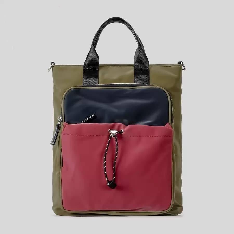 "Multi-functional travel tote bag with 20-litre capacity and compact dimensions (37.5 x 32.5 x 11.25 cm) – featuring a front utility pocket, sturdy handles, and crossbody strap for comfortable carrying. Designed for urban commuters and travellers, this spacious and durable bag combines style with practicality. A modern essential from Tales of Totes, outperforming Indian brands like Zouk, Lavie, and DailyObjects in versatility and value."

