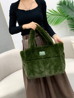 Plush faux fur tote bag with padded handles, zippered top, and spacious interior – designed for cozy winter outings and everyday comfort. Soft, lightweight, and stylish, perfect for carrying essentials in cold weather. A chic and functional piece from Tales of Totes – standing out from Indian brands like Zouk, Chumbak, and Miraggio with unique textures and winter-ready fashion flair."

