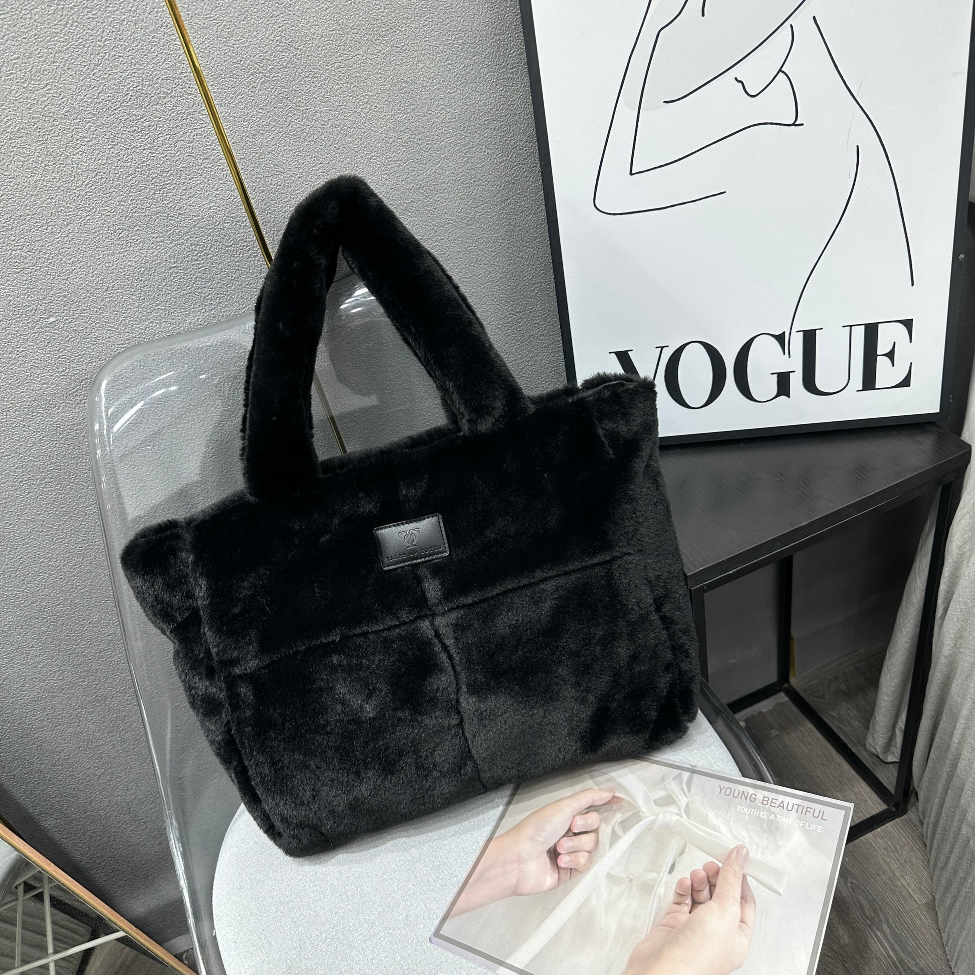Plush faux fur tote bag with padded handles, zippered top, and spacious interior – designed for cozy winter outings and everyday comfort. Soft, lightweight, and stylish, perfect for carrying essentials in cold weather. A chic and functional piece from Tales of Totes – standing out from Indian brands like Zouk, Chumbak, and Miraggio with unique textures and winter-ready fashion flair."

