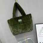 Plush faux fur tote bag with padded handles, zippered top, and spacious interior – designed for cozy winter outings and everyday comfort. Soft, lightweight, and stylish, perfect for carrying essentials in cold weather. A chic and functional piece from Tales of Totes – standing out from Indian brands like Zouk, Chumbak, and Miraggio with unique textures and winter-ready fashion flair."

