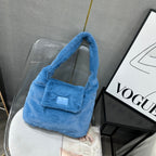 Soft faux fur tote bag with padded handles, front flap pocket, and zippered main compartment – designed for cozy winter style and functional everyday use. Spacious enough for essentials like cosmetics, wallet, and phone. A trendy winter accessory from Tales of Totes, offering stylish comfort beyond Indian brands like Zouk, Chumbak, and Miraggio."


