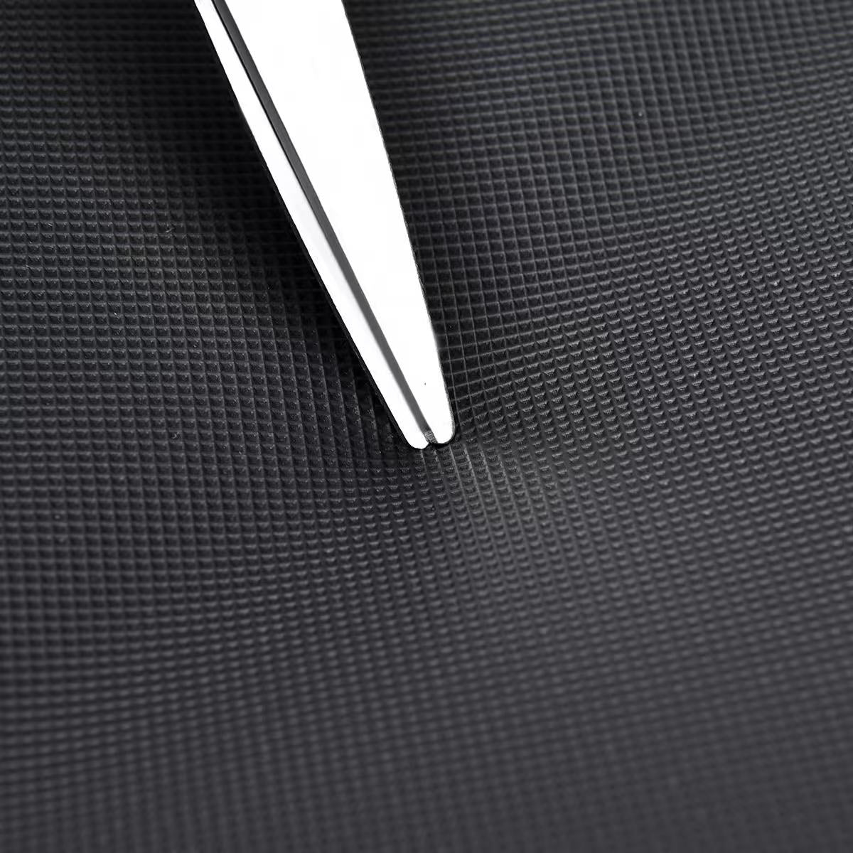 Close-up of a silver pen on a textured black surface Black laptop office tote bag for men and women by Tales of Tote, premium faux leather formal bag designed for Indian professionals — sleek, minimalist, lightweight, padded laptop compartment, ideal for work, meetings, hybrid jobs, gifting, and daily commute. Stylish work tote with zipper closure, dual handles, and waterproof finish. Unisex corporate tote for executives, startup founders, students, and remote workers. Best office bag India 2025. Perfect fo