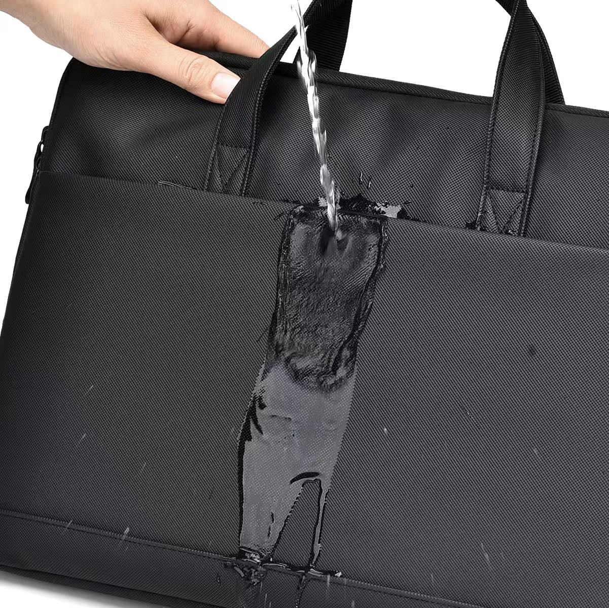 Black bag being soaked with water to demonstrate water resistance. Black laptop office tote bag for men and women by Tales of Tote, premium faux leather formal bag designed for Indian professionals — sleek, minimalist, lightweight, padded laptop compartment, ideal for work, meetings, hybrid jobs, gifting, and daily commute. Stylish work tote with zipper closure, dual handles, and waterproof finish. Unisex corporate tote for executives, startup founders, students, and remote workers. Best office bag India 20