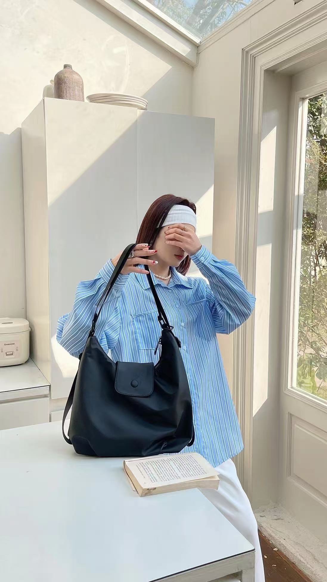 Person holding a black handbag indoors with a neutral background,Black and orange bags on a white surface with a neutral background,laptop tote bag for women, tote bag for office use, college tote bag with zipper, and stylish bags for girls. You can also target users with specific needs by using long-tail phrases like vegan leather tote bag or tote bag for daily use in India. To understand the market better, keep an eye on competitors such as Lavie, Baggit, and Caprese, all of which are major players in the