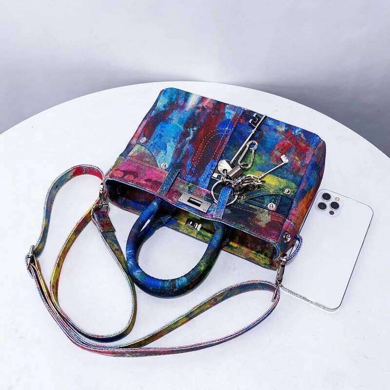 Colorful handbag with a pattern on a white surface