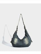 Denim handbag on a white background