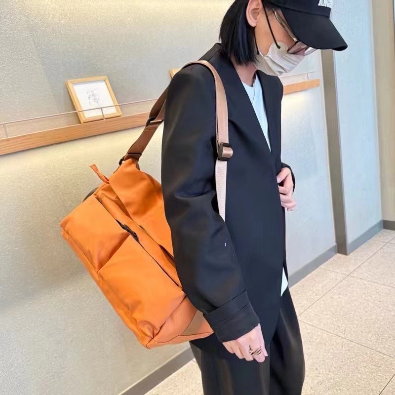 Brown backpack on a white background,A padded, water-resistant shoulder bag with a roomy interior, zip closure, and adjustable strap, designed for everyday carry and positioned as a stylish alternative to popular Indian brands like Zouk, Miraggio, Lavie, Caprese, and DailyObjects.