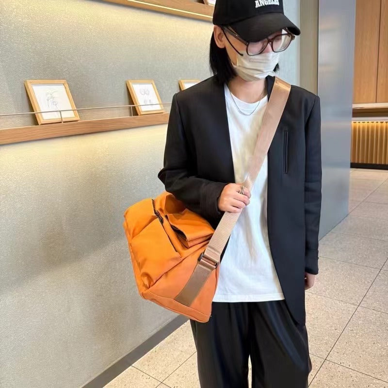 Brown backpack on a white background,A padded, water-resistant shoulder bag with a roomy interior, zip closure, and adjustable strap, designed for everyday carry and positioned as a stylish alternative to popular Indian brands like Zouk, Miraggio, Lavie, Caprese, and DailyObjects.