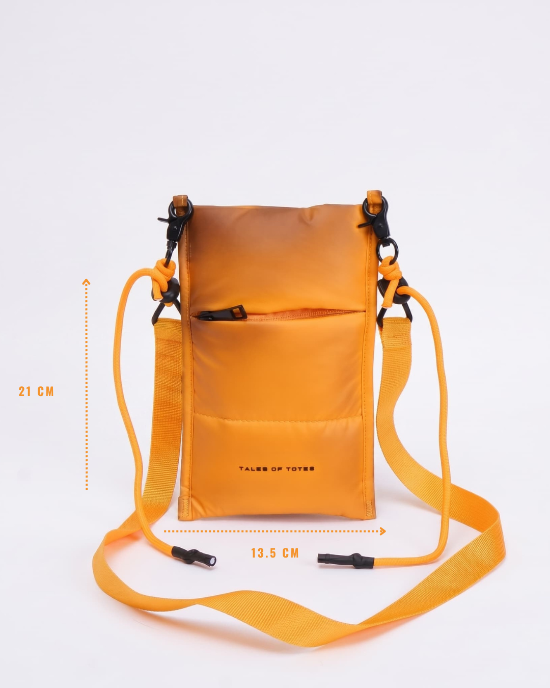 Orange crossbody bag with measurement details on a white background