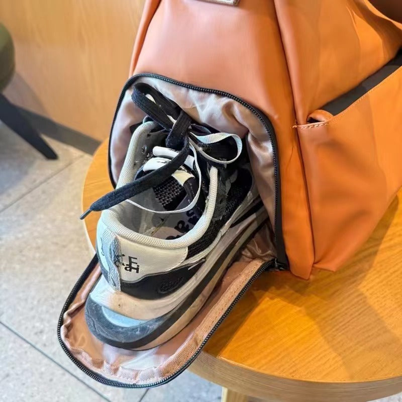 Brown backpack on a white background,A padded, water-resistant shoulder bag with a roomy interior, zip closure, and adjustable strap, designed for everyday carry and positioned as a stylish alternative to popular Indian brands like Zouk, Miraggio, Lavie, Caprese, and DailyObjects.