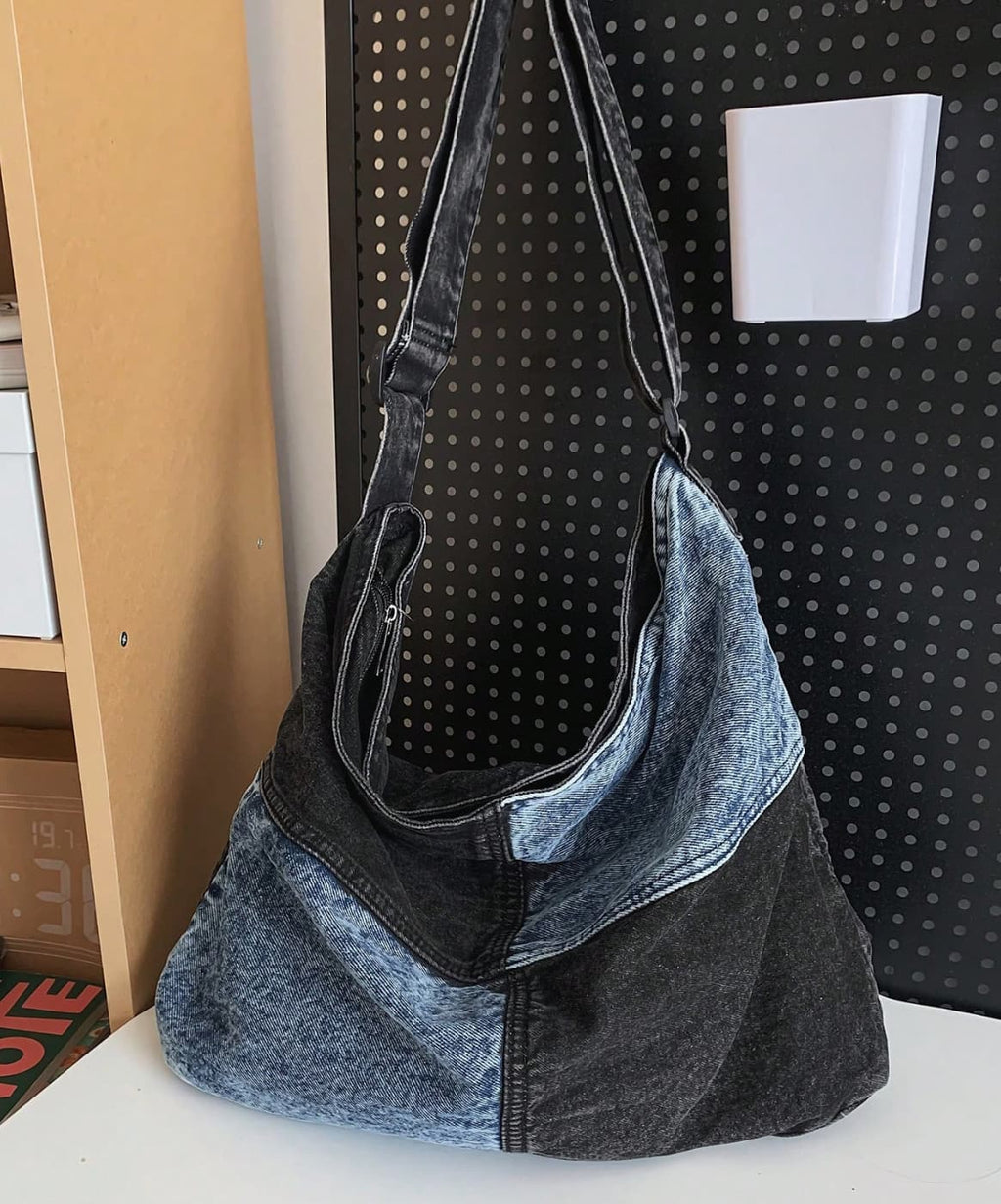 Two-tone patchwork denim sling tote bag with adjustable shoulder strap – measuring 40cm x 35cm x 13cm, perfect for everyday use. Lightweight yet spacious, ideal for college, shopping, and casual outings. A trendy pick for Gen Z fashion in India, exclusively at Tales of Totes – outshining Zouk, Chumbak, and other Indian tote brands with bold streetwear flair."

