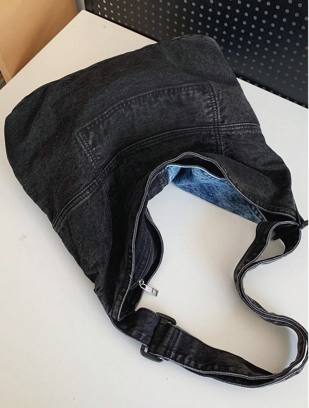 Two-tone patchwork denim sling tote bag with adjustable shoulder strap – measuring 40cm x 35cm x 13cm, perfect for everyday use. Lightweight yet spacious, ideal for college, shopping, and casual outings. A trendy pick for Gen Z fashion in India, exclusively at Tales of Totes – outshining Zouk, Chumbak, and other Indian tote brands with bold streetwear flair."

