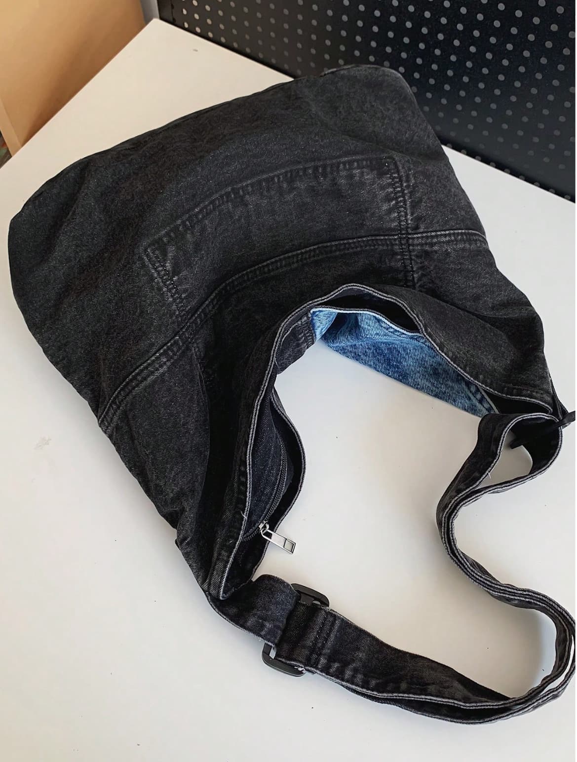Two-tone patchwork denim sling tote bag with adjustable shoulder strap – measuring 40cm x 35cm x 13cm, perfect for everyday use. Lightweight yet spacious, ideal for college, shopping, and casual outings. A trendy pick for Gen Z fashion in India, exclusively at Tales of Totes – outshining Zouk, Chumbak, and other Indian tote brands with bold streetwear flair."

