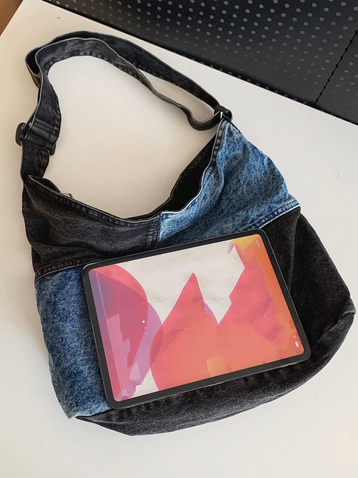 Two-tone patchwork denim sling tote bag with adjustable shoulder strap – measuring 40cm x 35cm x 13cm, perfect for everyday use. Lightweight yet spacious, ideal for college, shopping, and casual outings. A trendy pick for Gen Z fashion in India, exclusively at Tales of Totes – outshining Zouk, Chumbak, and other Indian tote brands with bold streetwear flair."

