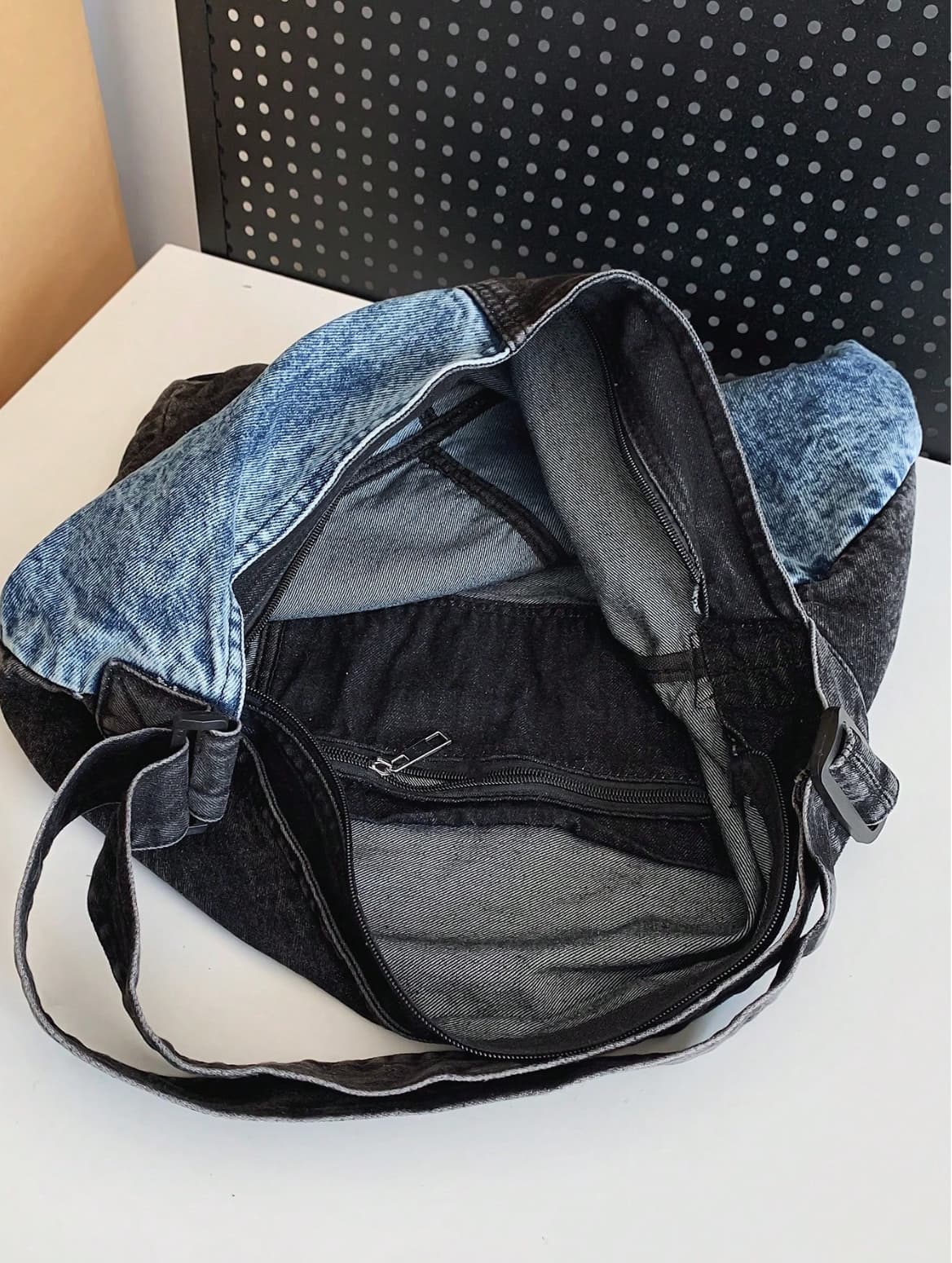 Two-tone patchwork denim sling tote bag with adjustable shoulder strap – measuring 40cm x 35cm x 13cm, perfect for everyday use. Lightweight yet spacious, ideal for college, shopping, and casual outings. A trendy pick for Gen Z fashion in India, exclusively at Tales of Totes – outshining Zouk, Chumbak, and other Indian tote brands with bold streetwear flair."

