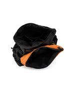 Black and orange bag on a white background