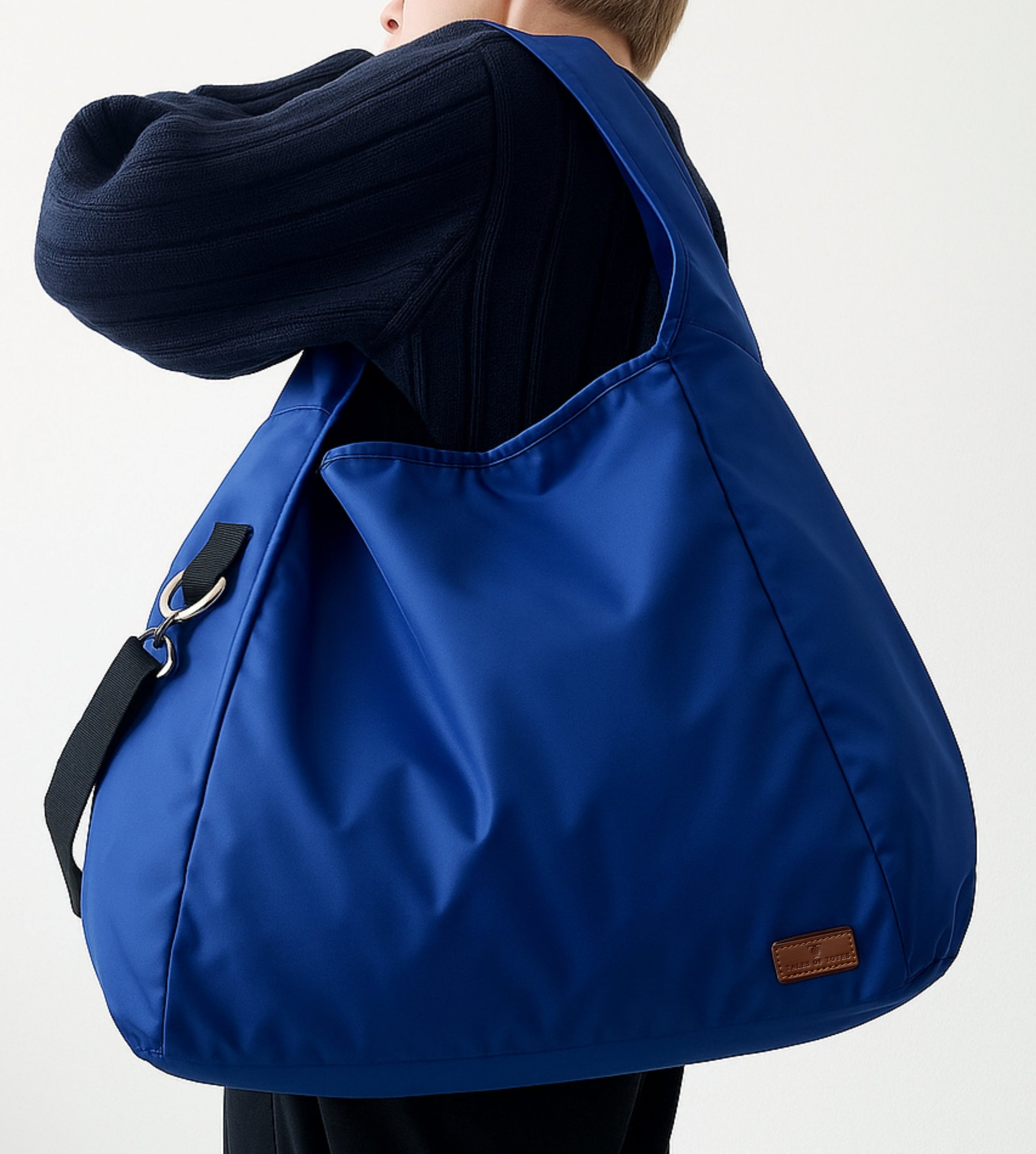 Trendy unisex tote bag for college, office, and travel – quilted puffer design with padded straps for comfort and style. Spacious and lightweight, ideal for urban streetwear looks. Best-selling tote bag for girls and boys under ₹1500 in India. Premium tote from Tales of Totes, India’s top tote bag brand competing with Zouk, Chumbak, Lavie, Miraggio, and DailyObjects. Perfect for Gen Z, millennials, and conscious fashion shoppers looking for utility and style in one bag."

