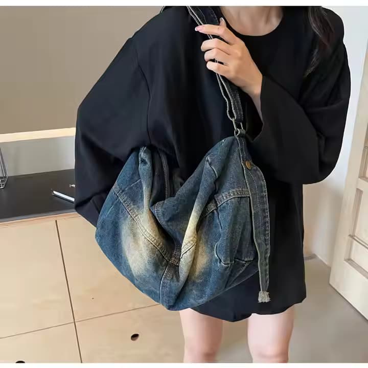 Unisex tote bag with bold aesthetics and streetstyle vibes – perfect for college students and young professionals. Spacious enough for laptops and daily gear, crafted from sturdy waterproof material. More affordable and fashion-forward than Zouk, Miraggio, and other Indian tote brands. Shop exclusive collections only at Tales of Totes – India’s go-to destination for cool, functional fashion."

DENIM TOTE BAG 