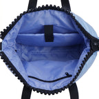 Blue bag interior with black zipper and straps on a white background