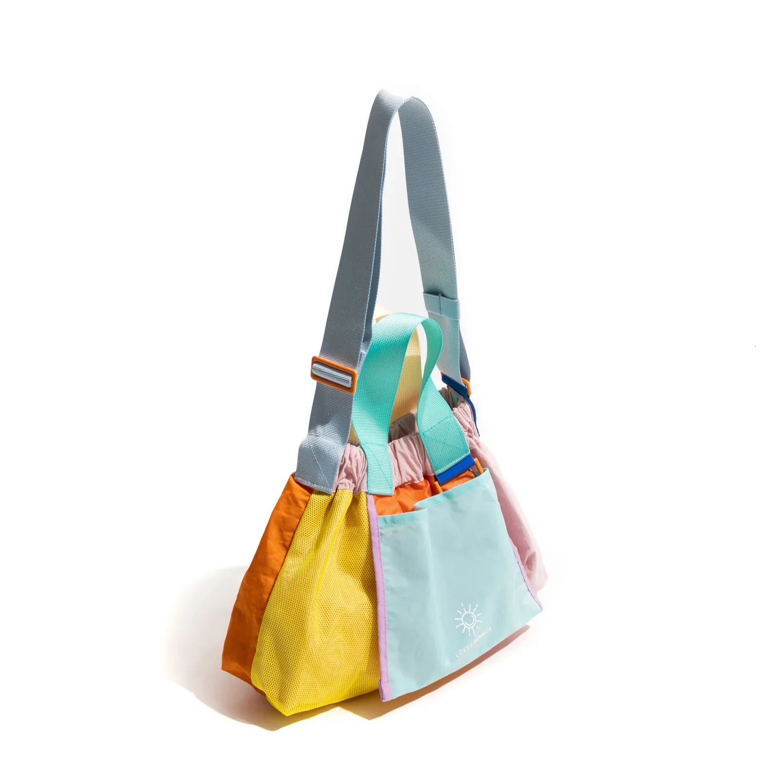 Colorful handbag with a patterned interior on a white background