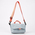 Compact, functional and made to stand out.

Designed for everyday movement, this crossbody bag pairs a clean, softly structured body with contrast utility details. The curved front flap keeps the silhouette minimal, while the bold webbing strap and knotted rope handle give it a sporty, technical edge.

Wear it crossbody for everyday errands, over the shoulder, or carry it by the rope handle when you want to switch things up. Lightweight and easy to style, it’s sized for your daily essentials without feeling