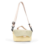 Compact, functional and made to stand out.

Designed for everyday movement, this crossbody bag pairs a clean, softly structured body with contrast utility details. The curved front flap keeps the silhouette minimal, while the bold webbing strap and knotted rope handle give it a sporty, technical edge.

Wear it crossbody for everyday errands, over the shoulder, or carry it by the rope handle when you want to switch things up. Lightweight and easy to style, it’s sized for your daily essentials without feeling