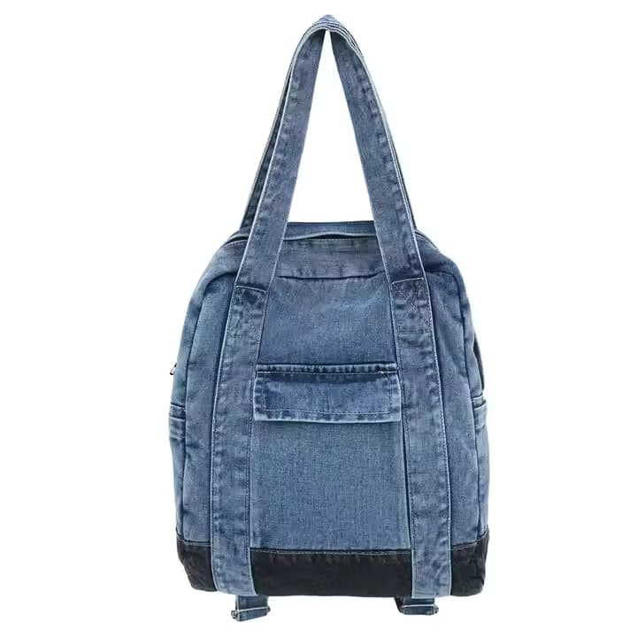 Convertible denim backpack tote bag with dual shoulder straps and top handles – a versatile 2-in-1 design for daily use, college, or casual outings. Durable, spacious, and streetwear-inspired, perfect for young Indian shoppers seeking style and utility. Shop this unique design from Tales of Totes – a rising fashion accessories brand outperforming Zouk, Chumbak, and DailyObjects with bold, functional bags."

