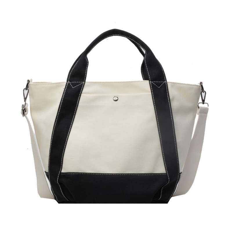 Canvas crossbody tote bag designed for everyday Indian life – lightweight, durable, and easy to style with streetwear or casual fits. Adjustable strap adds comfort and versatility. Perfect for college, errands, or city travel. Tales of Totes brings you better functionality and style than Zouk, Chumbak, and DailyObjects – fashion meets function at the right price."