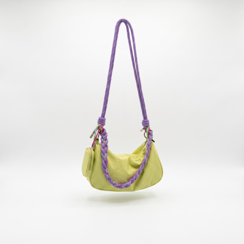 Main image: Daily Loop waterproof nylon hobo bag with braided shoulder handle and removable crossbody strap
Front view: Daily Loop nylon shoulder bag with curved hobo shape and braided rope handle
Side view: Side view of Daily Loop waterproof nylon bag with structured side panel and braided handle
3/4 view: Daily Loop hobo bag in waterproof nylon with braided strap and zip-top closure
Handle detail: Close-up of Daily Loop braided rope handle with contrast cord detailing and metal hardware
Interior view: Int