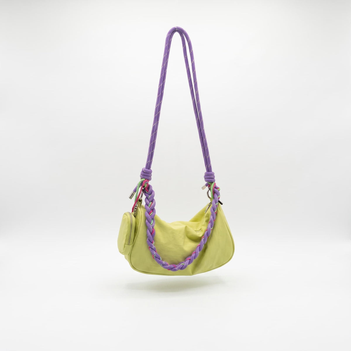Main image: Daily Loop waterproof nylon hobo bag with braided shoulder handle and removable crossbody strap
Front view: Daily Loop nylon shoulder bag with curved hobo shape and braided rope handle
Side view: Side view of Daily Loop waterproof nylon bag with structured side panel and braided handle
3/4 view: Daily Loop hobo bag in waterproof nylon with braided strap and zip-top closure
Handle detail: Close-up of Daily Loop braided rope handle with contrast cord detailing and metal hardware
Interior view: Int
