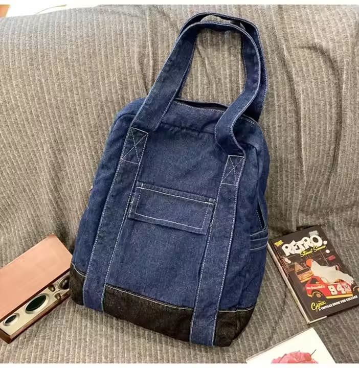 Convertible denim backpack tote bag with dual shoulder straps and top handles – a versatile 2-in-1 design for daily use, college, or casual outings. Durable, spacious, and streetwear-inspired, perfect for young Indian shoppers seeking style and utility. Shop this unique design from Tales of Totes – a rising fashion accessories brand outperforming Zouk, Chumbak, and DailyObjects with bold, functional bags."

