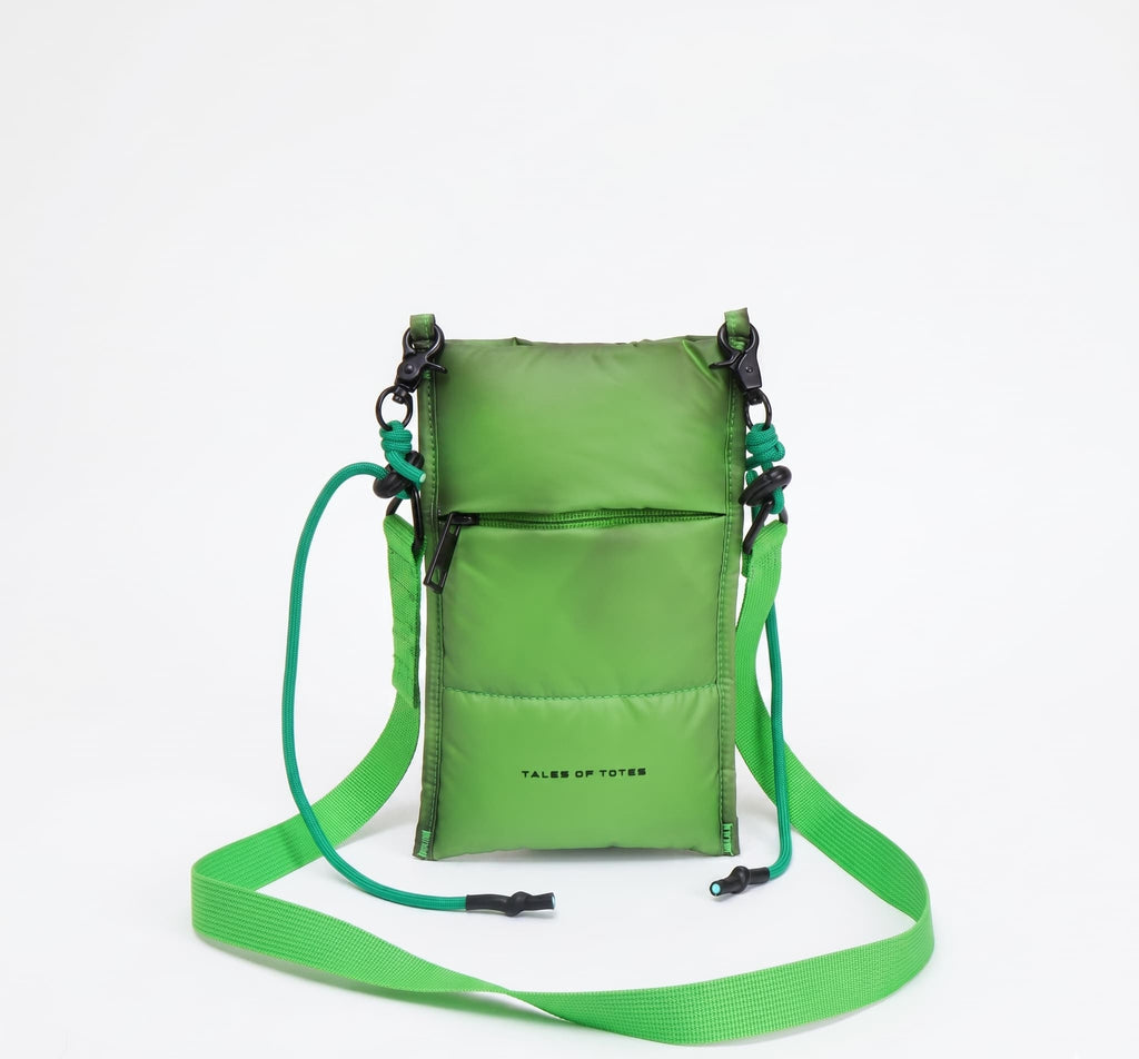 Green crossbody bag with a strap on a white background