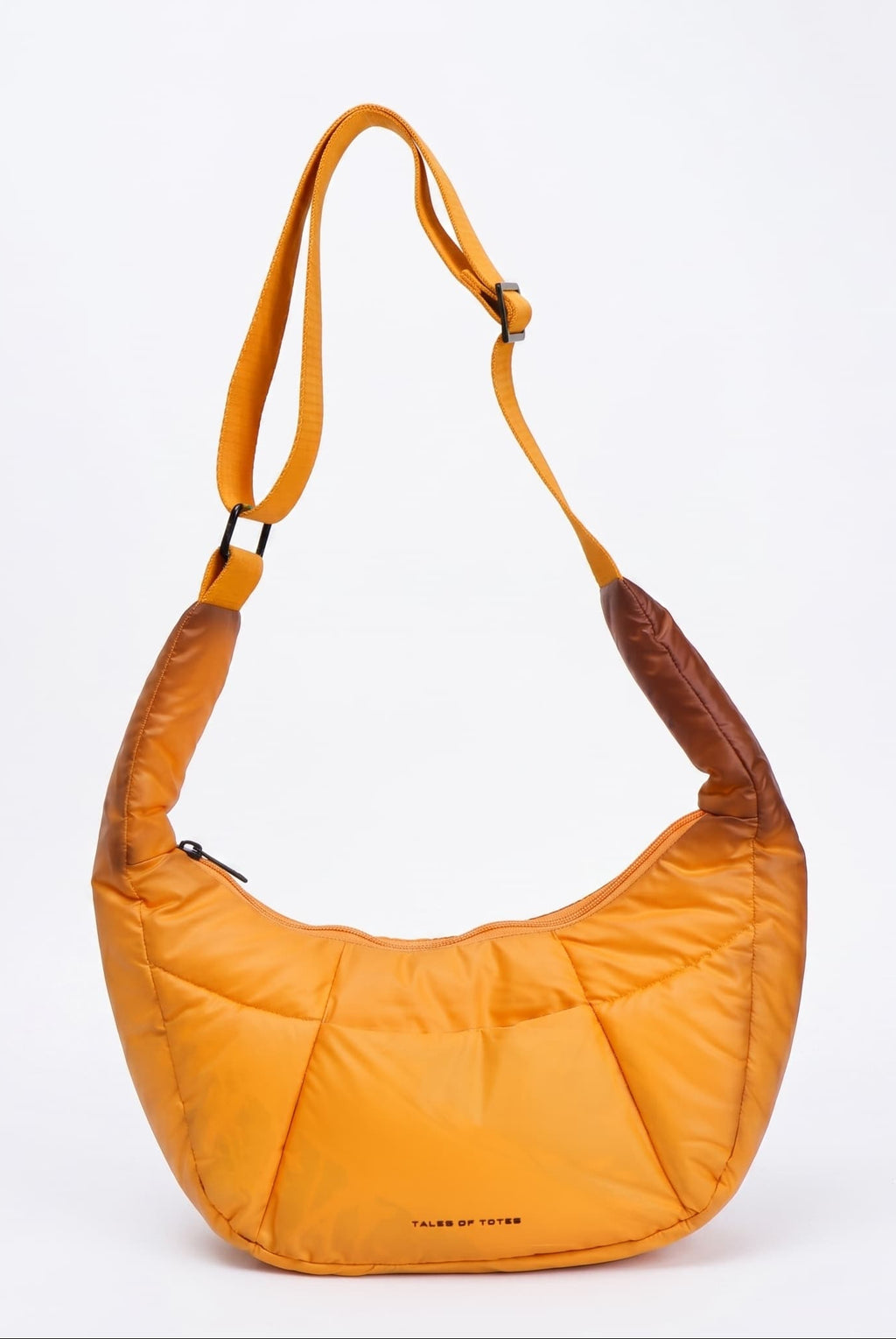 Orange shoulder bag with brown accents on a white background