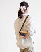 2-in-1 waterproof nylon backpack with detachable mini crossbody bag and multiple storage pockets
Beige and dusty rose nylon backpack set with removable crossbody pouch and adjustable straps
Lightweight waterproof nylon backpack with detachable sling bag and utility pockets
Convertible everyday backpack and crossbody bag set with drawstring side pockets
Multi-pocket nylon backpack with detachable mini bag for travel, college and everyday use

For your main product image, I’d use the first one.