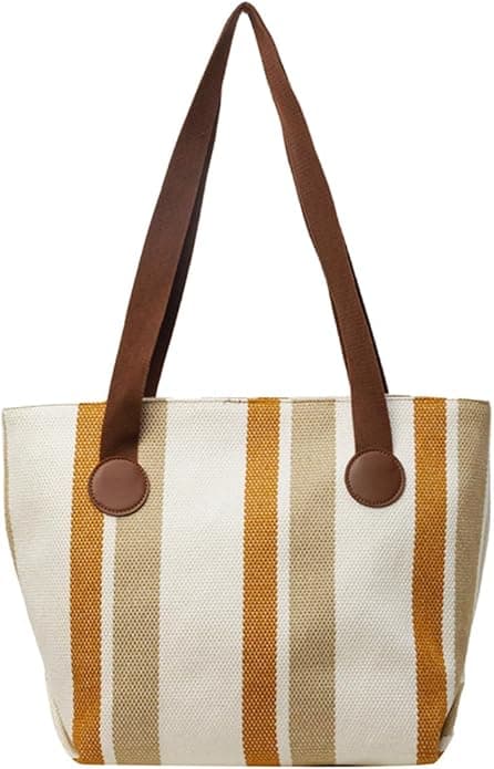 Stylish striped jute tote bag with earthy yellow and beige tones, featuring long brown shoulder straps and circular leather-look accents. Lightweight, eco-conscious, and perfect for daily use, shopping, or office carry. A trendy, sustainable option from Tales of Totes – designed to stand out among Indian tote brands like Chumbak, Baggit, and Zouk."