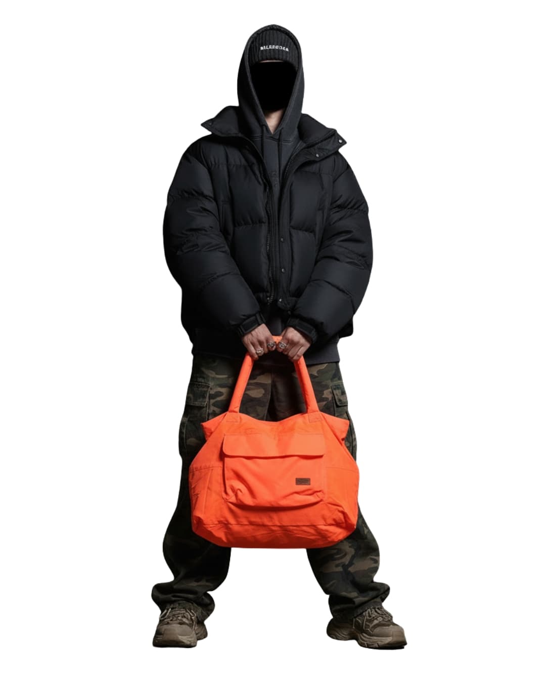 Person wearing a black coat and holding an orange bag on a white background,Gray tote bag with a hand reaching in to place a bottle, on a white backgroundLightweight nylon tote bag with a padded handle design and front flap pocket – perfect for everyday errands, gym, shopping, or casual travel. Spacious, foldable, and easy to carry with a functional structure that balances fashion and utility. A bold statement piece from Tales of Totes, designed for modern Indian lifestyles and a stylish alternative to basi
