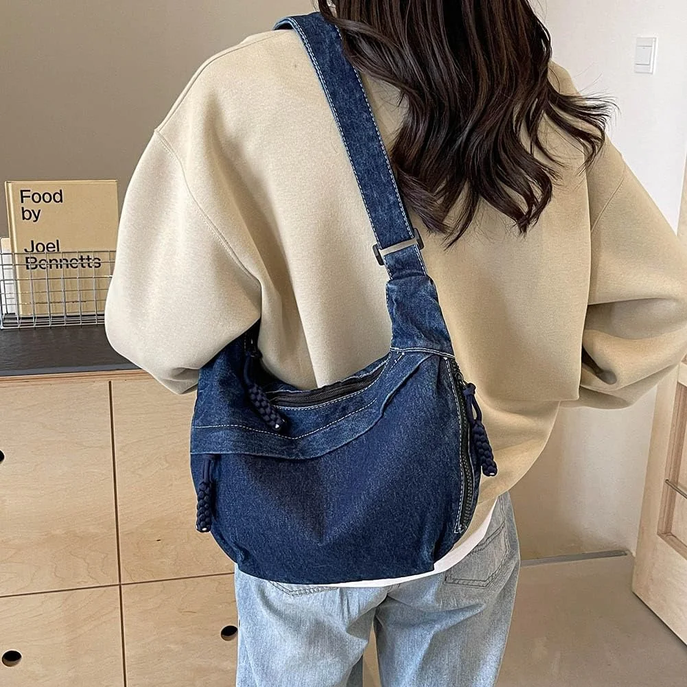 Everyday denim sling bag for women, styled with beige sweatshirt and relaxed jeans, streetwear essentials