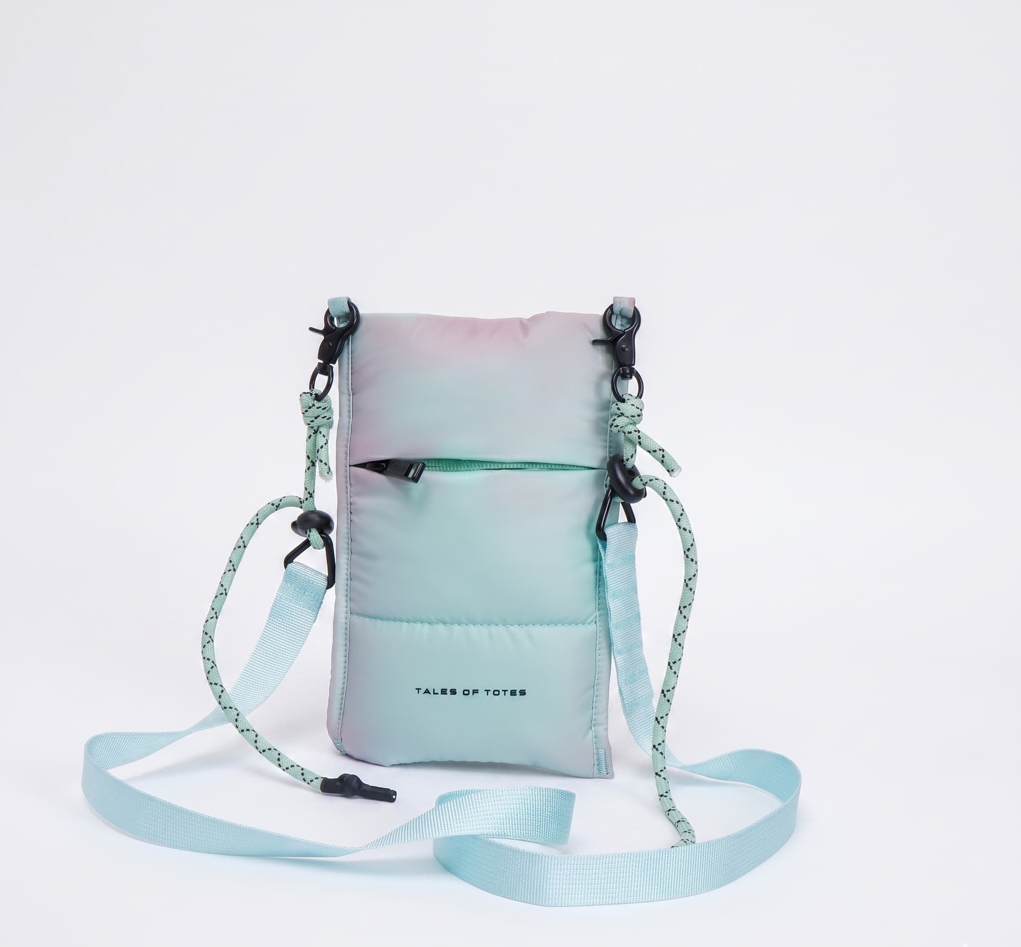 Gradient blue and pink crossbody bag with a strap on a light gray background