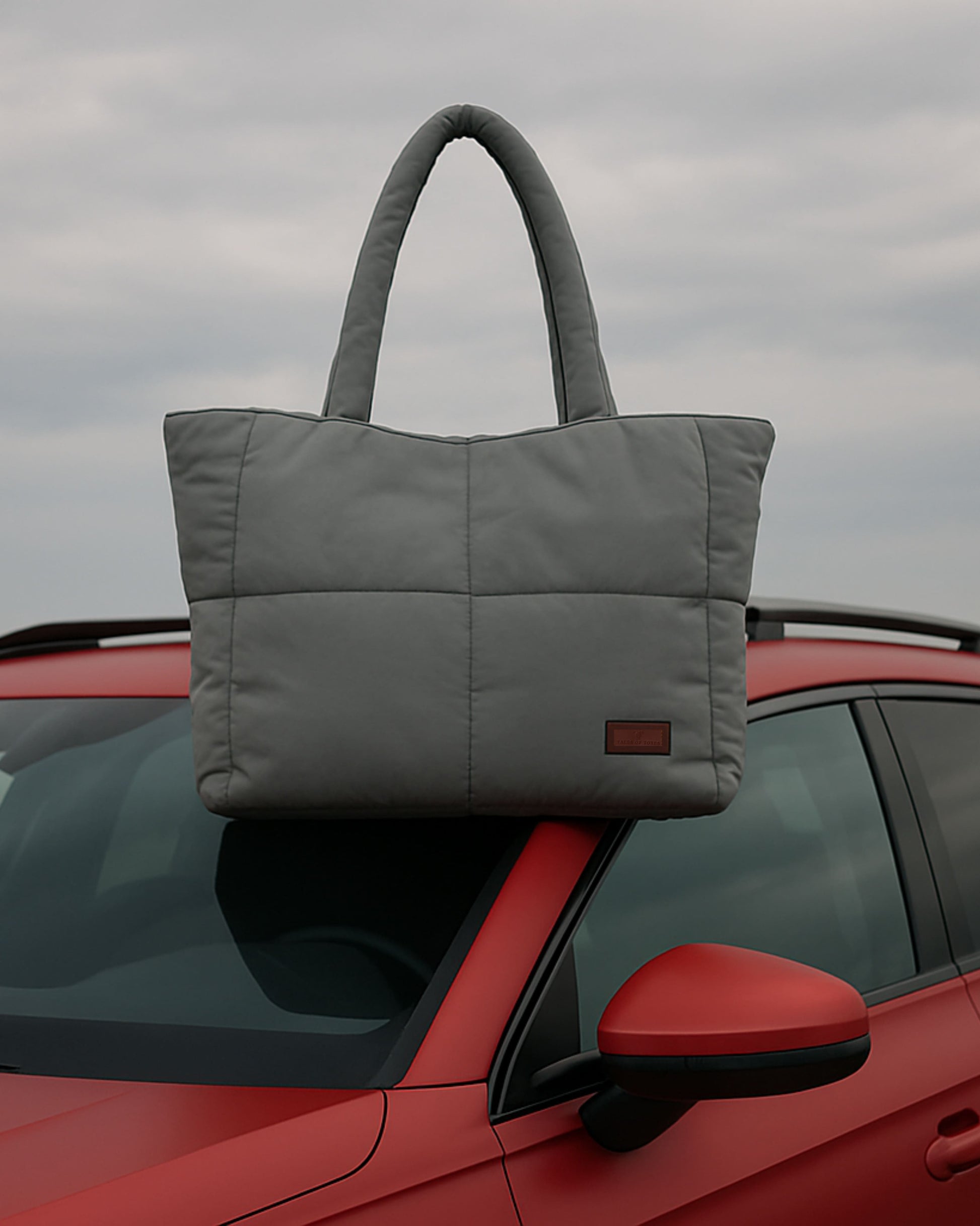 Quilted puffer tote bag with padded handles and a soft structured silhouette – lightweight, stylish, and perfect for daily use, college, travel, or shopping. Designed for comfort and statement appeal, this spacious carryall from Tales of Totes is a trendy alternative to Zouk, Lavie, and DailyObjects in India’s fashion accessories market."
