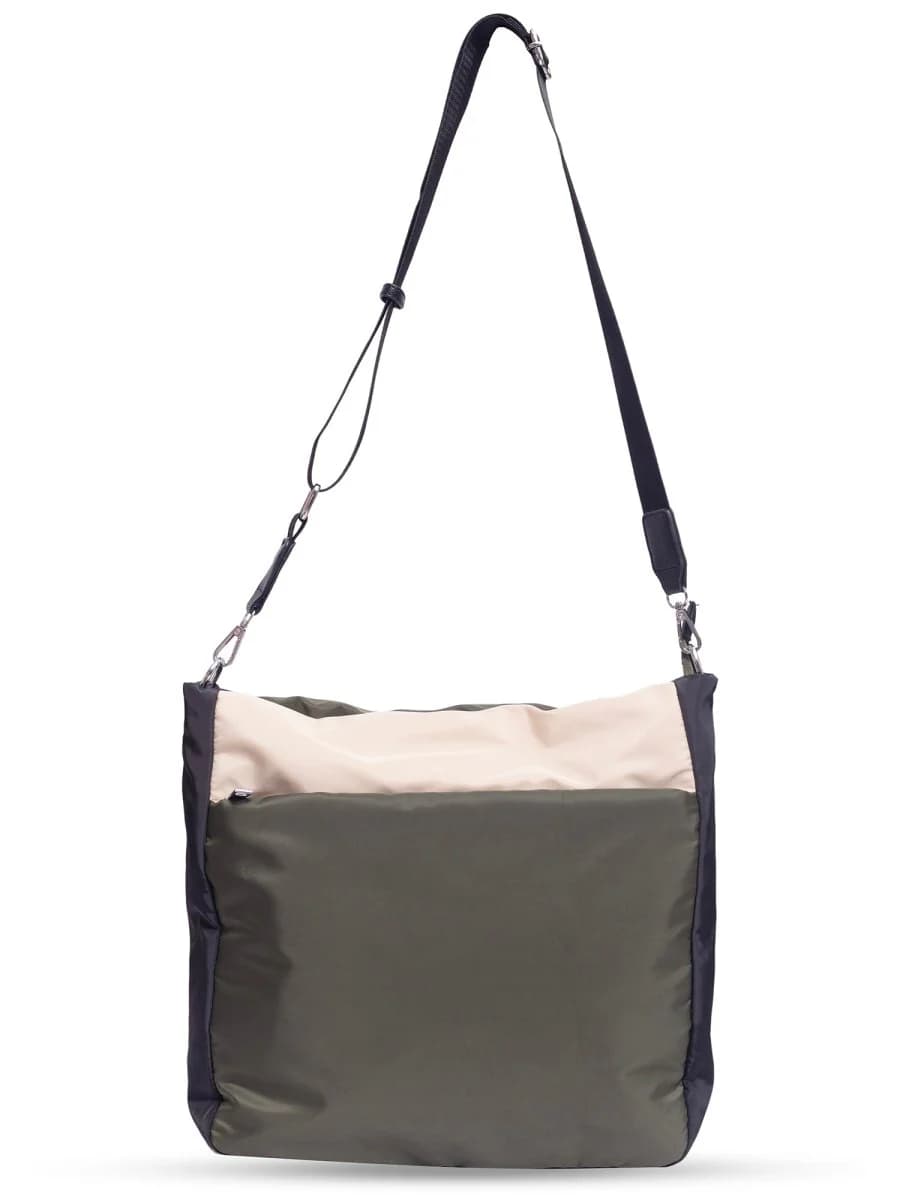 Multi-pocket travel tote bag with 20-litre capacity and compact dimensions (35 x 35 x 10 cm), featuring a wide adjustable strap and color-blocked utility design. Lightweight, durable, and ideal for travel, college, or daily use. A high-performance everyday essential from Tales of Totes – built for comfort, style, and smart organization in India’s fast-paced lifestyle."

